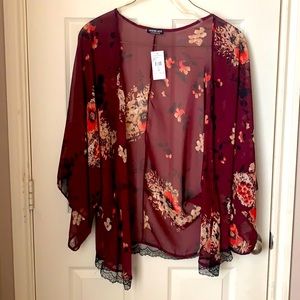 Burgundy Kabuki Kimono with printed flowers.